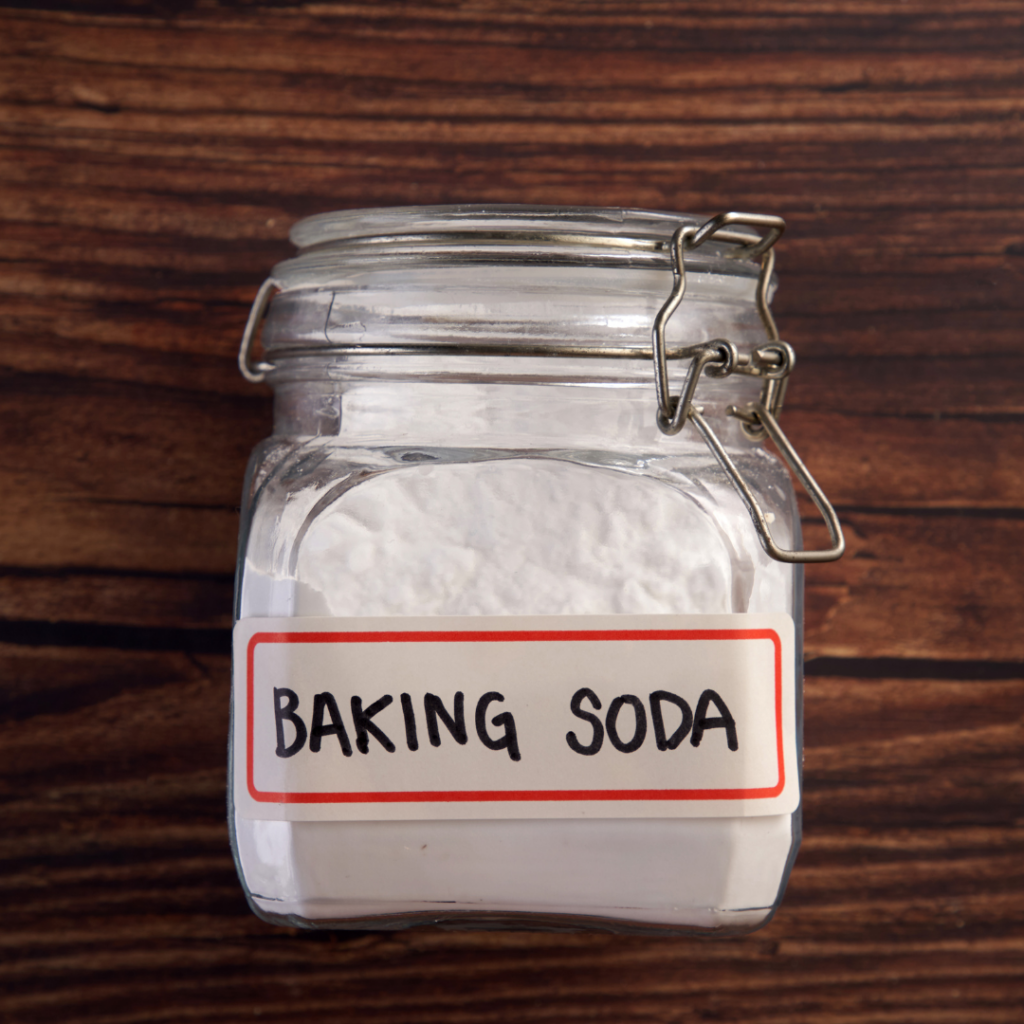 A glass jar of baking soda.