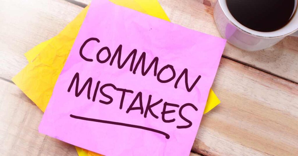 A sticky note with the words "Common Mistakes" written with a marker.